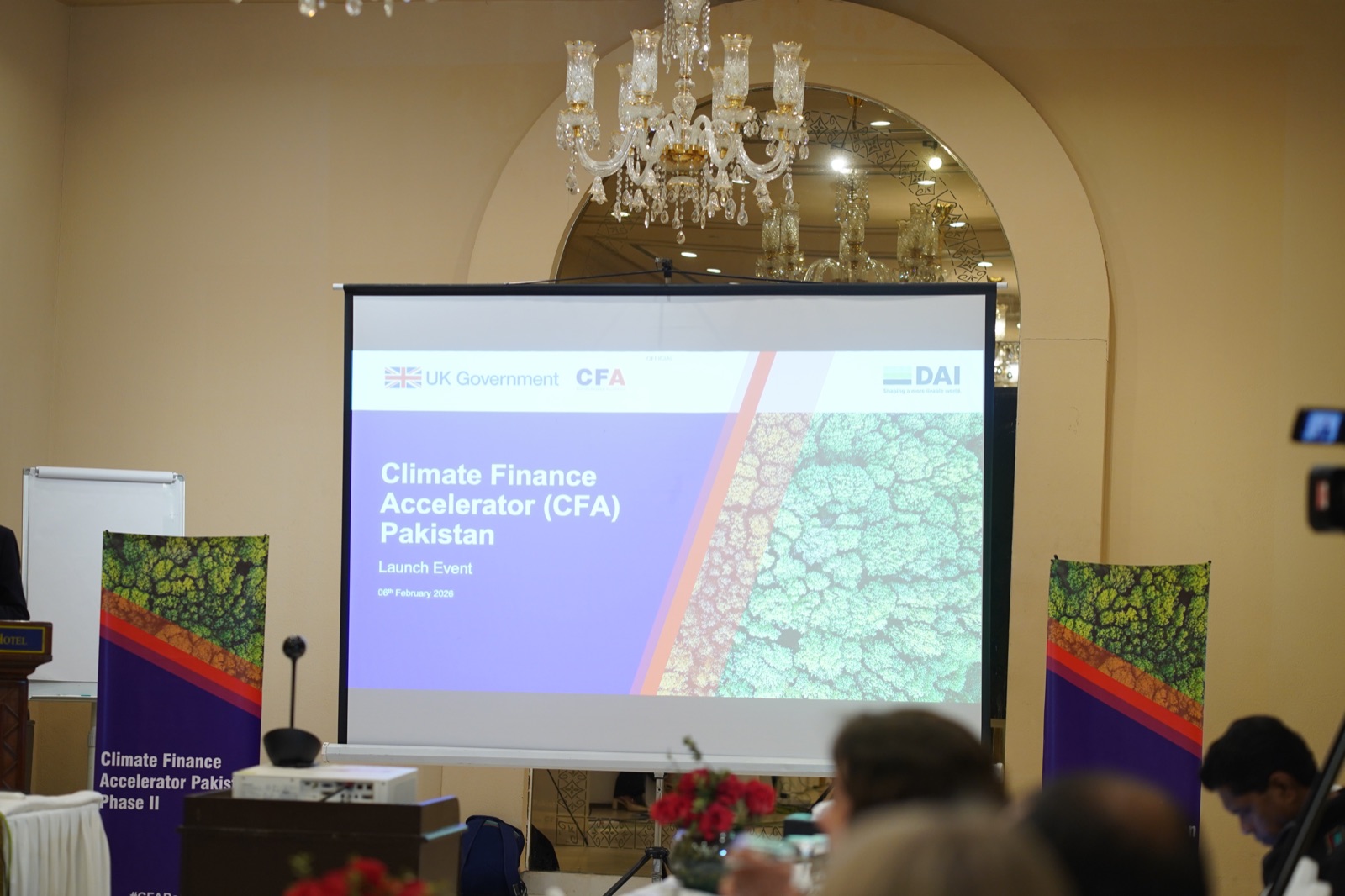 The Climate Finance Accelerator Pakistan launch event, with the programme's opening slide projected to the room.