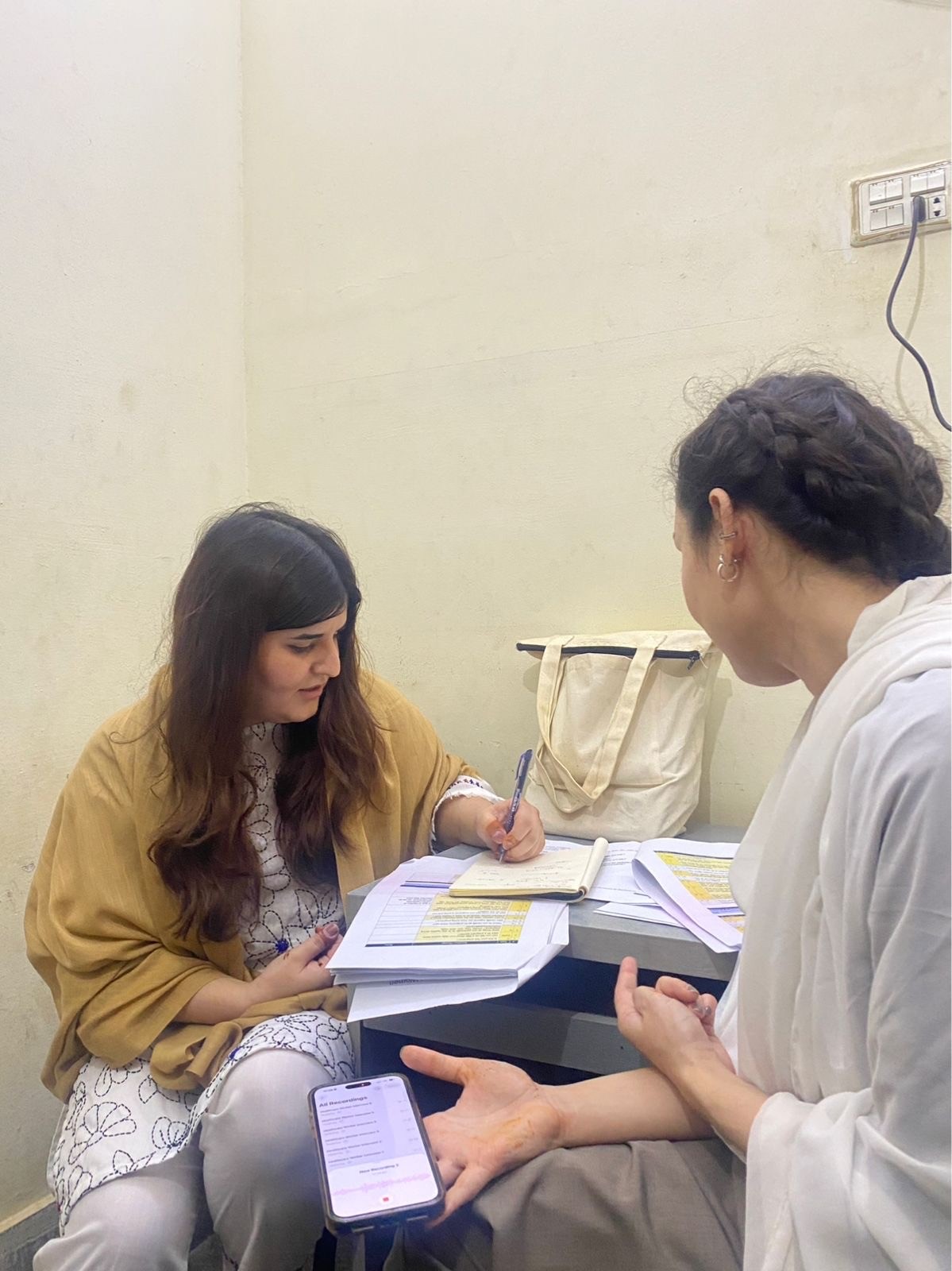Field research interview during the maternal health study in Pakistan.