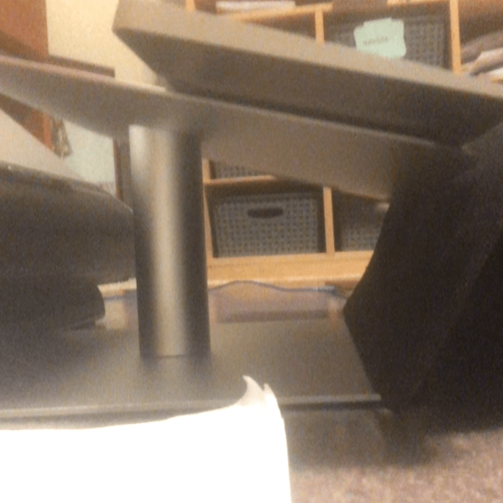 The actual setup in use, showing part of the stand and the mouse pad heel support.